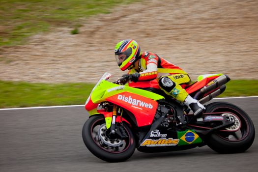 JEREZ DE LA FRONTERA, SPAIN - NOV 20: Stock Extreme motorcyclist Jose Gomez takes a curve in the CEV championship on Nov 20, 2010, in Jerez de la Frontera, Spain