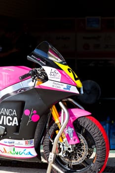 JEREZ DE LA FRONTERA, SPAIN - APR 17: Moto2 Motorcycle of Ivan Moreno waiting in the pitlane in the CEV Championship on April 17, 2011, in Jerez de la Frontera