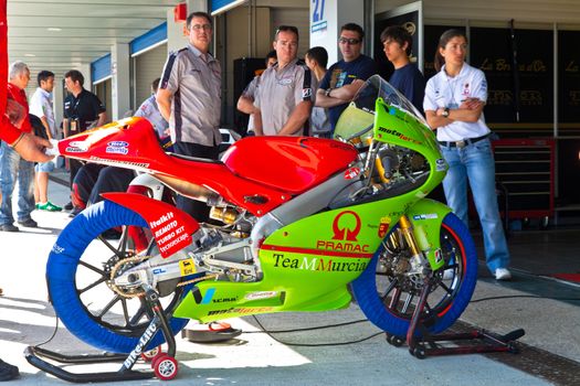 JEREZ DE LA FRONTERA, SPAIN - APR 17: 125cc Motorcycle of Juanfran Guevara waiting in the pitlane in the CEV Championship on April 17, 2011, in Jerez de la Frontera, Spain.
