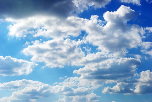 blue sky background with tiny clouds