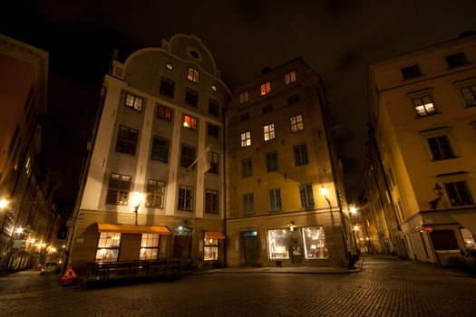 Two houses in the night in the middle of Stockholm