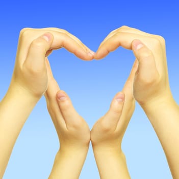 woman’s hands made in the form of heart