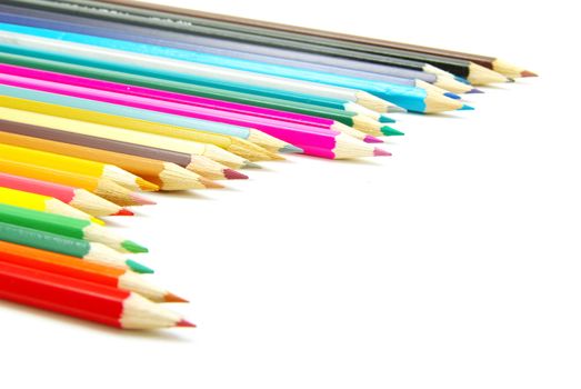  Assortment of coloured pencils  on white background