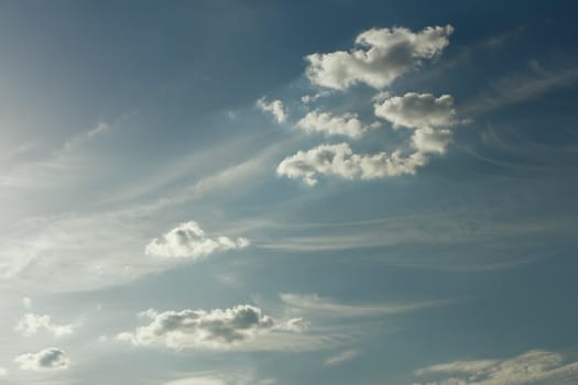 Clouds against the background of blue sky