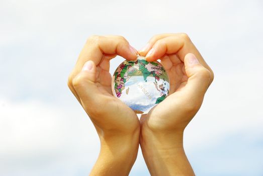 globe on the human hand