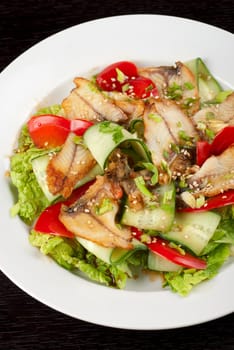 Salad of smoked eel, lettuce,Chinese cabbage and vegetables