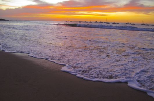 Sunset in Costa Rica.  Toned sunset image with good depth of field and slow shutter to capture the motion of the ocean