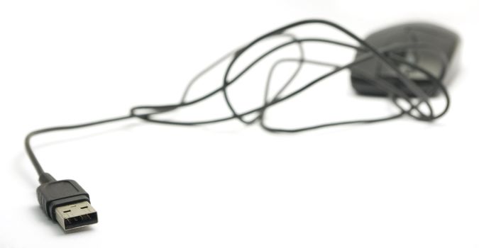 a usb mouse with focus on the tip of the wire, for technology or business background.