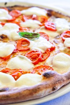 This is a true Italian Pizza. Traditional Pizza Margherita served in a Capri's restaurant, Naples Gulf, Italy.