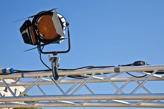 Reflector in an outdoor theater with blue sky background