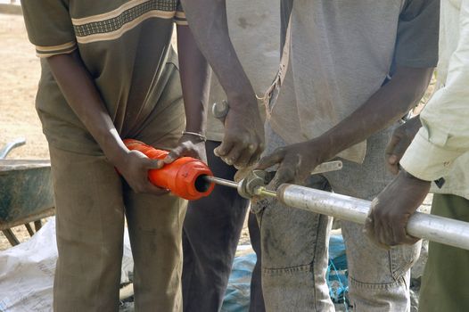 Water is not surfaces some in Africa, but with 40 meters under ground. Humanitarian associations finance and make install pumps in order to draw this water for the life of the village.                                 
