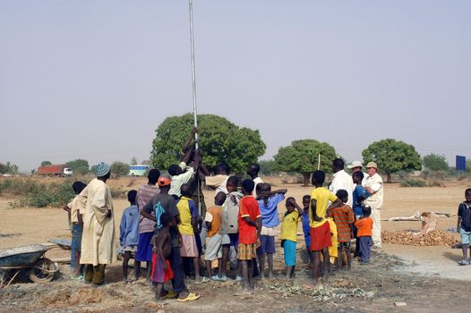 Water is not surfaces some in Africa, but with 40 meters under ground. Humanitarian associations finance and make install pumps in order to draw this water for the life of the village.                                 