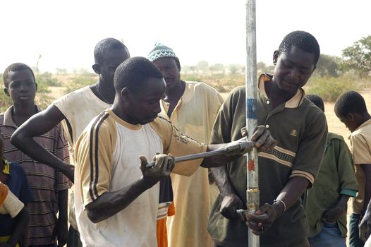 Water is not surfaces some in Africa, but with 40 meters under ground. Humanitarian associations finance and make install pumps in order to draw this water for the life of the village.                                 
