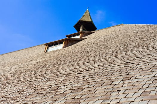 Roof detail of historical authentic architecture of old farm house in Black Forest, rural Germany