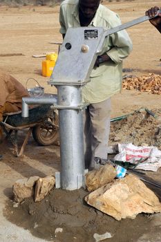 Water is not surfaces some in Africa, but with 40 meters under ground. Humanitarian associations finance and make install pumps in order to draw this water for the life of the village.                                 