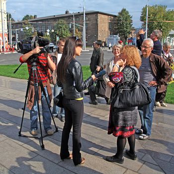 YAROSLAVL, RUSSIA - 11 SEPTEMBER: celebration of the millennium YAroslavl, Russia, September 11, 2010. The Interview on town street.