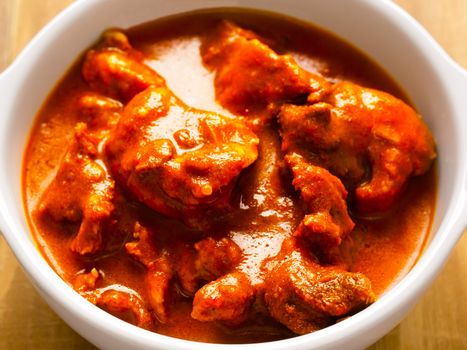 close up of a bowl of indian mutton curry