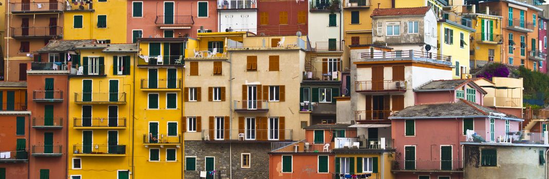 Colourful house frontings forming a beautiful background pattern. Cinque Terre - Italy.