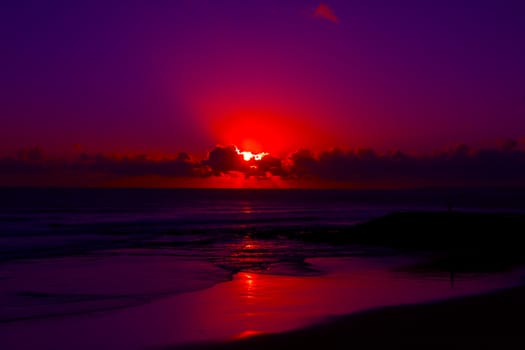 Nice sunset over sea beach. Costa de Caparica, Portugal