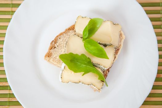 Delicious sandwich with blue cheese and fresh herbs