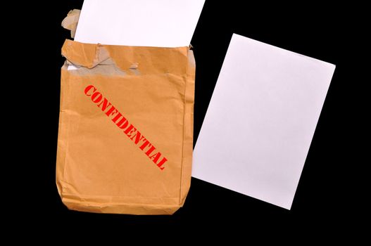 Open yellow envelope with top secret stamp and blank papers, on white background