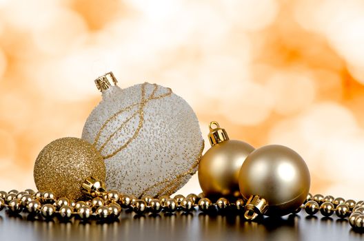 Christmas ball baubles with silver and gold decoration.