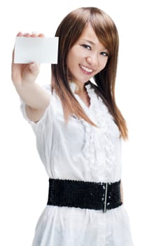 Asian female holding a blank business card and smiling at the camera