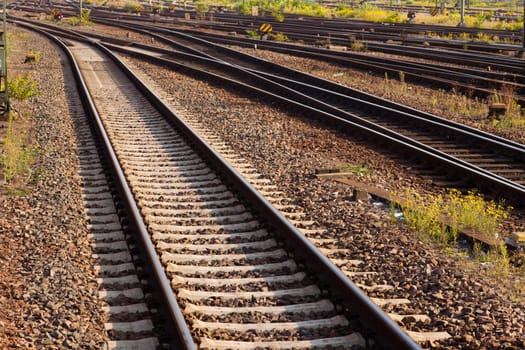 Railway Tracks and Switch near Train Station.