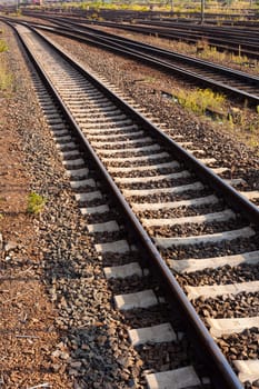 Railway Tracks and Switch near Train Station.