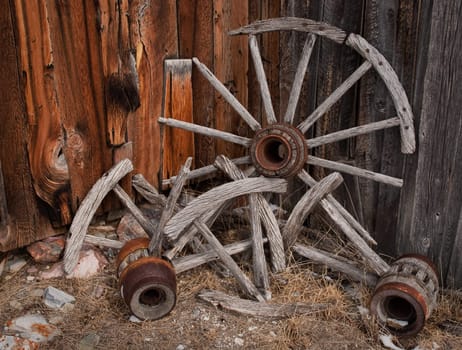 Broken and weathered wagon wheels, Bannack ghost town, Bannack State Park, Beaverhead County, Montana, USA