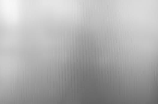 Shiny silver metal background or texture, real photo.