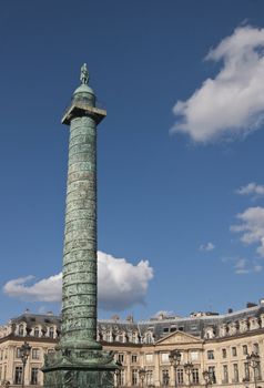 Statue of Napoleon on a tall ornate pillar in Place Vendome, Paris, France