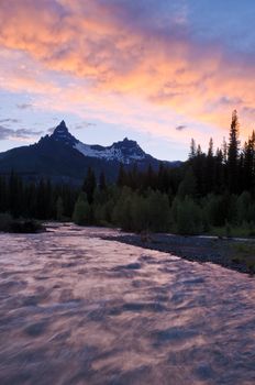 The Clarks Fork of the Yellowstone River and Pilot Peak at sunset, Shoshone National Forest, Park County, Wyoming, USA