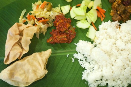 Overhead view Indian cuisine banana leaf rice