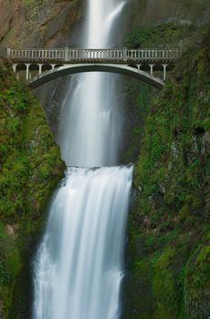 Multnomah Falls (tallest in Oregon - 629 ft.) and footbridge (built 1914) in spring, Columbia Gorge Scenic Area, Multnomah County, Oregon, USA