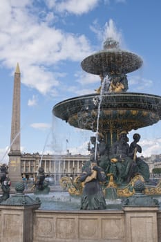 Fountain and ancient Egyptian obelisk in the Place de la Concorde in Paris, France