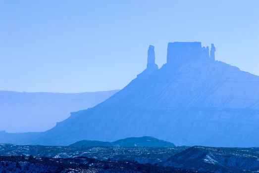 Castle Rock (center) and the Priest and Nuns on a winter afternoon, Grand County, Utah, USA