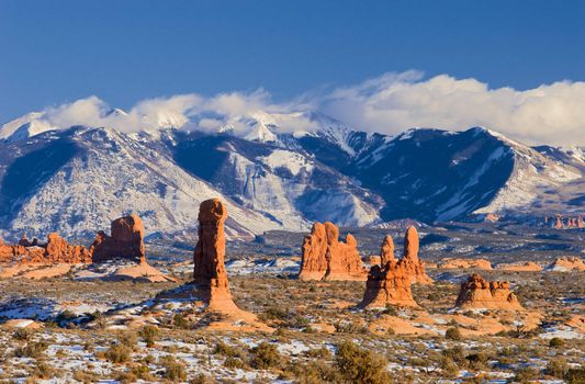 Sandstone monoliths and the La Sal Mountains, Arches National Park, Grand County, Utah, USA