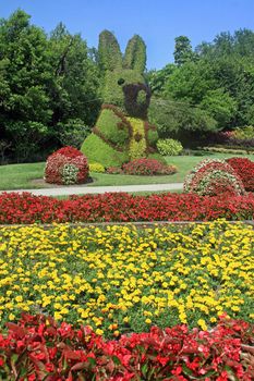 A large bunny topiary in beautiful gardens