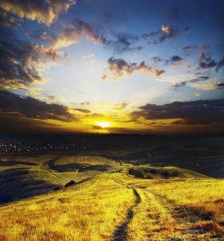 path on mountain meadow in nice day