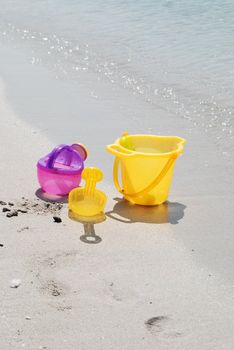 plastic toys on the beach