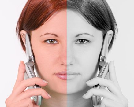 Bicolor image of a young woman using a mobile phone.Shot with Canon 70-200mm f/2.8L IS USM