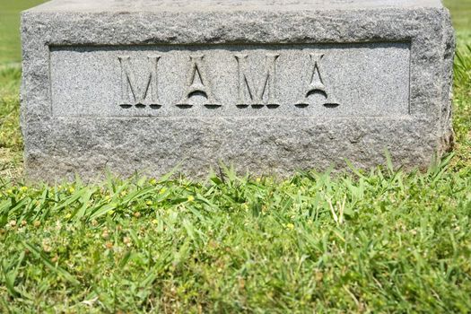 Gravestone marker with word "Mama" on it.