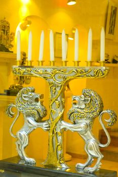 Traditional Hanukkah Menorah With All Candle, 
Supported By Lions.
