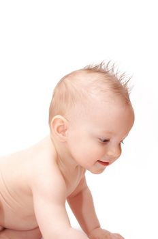 smiling baby with spiky hair in profile