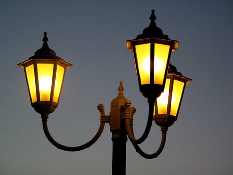 Glowing lantern on a blue background