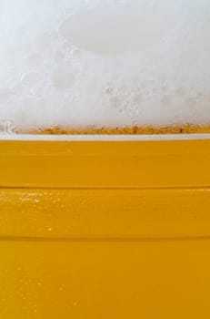 close-up of glass of beer with foam