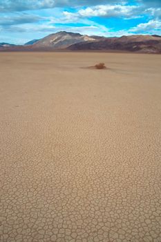 Racetrack Playa is a seasonally dry lake (a playa) located in the northern part of the Panamint Mountains in Death Valley National Park, California, U.S.A.. It is famous for 'sailing stones', rocks that mysteriously move across its surface.