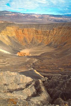 Ubehebe Crater is a large volcanic crater located at the north tip of the Cottonwood Mountains