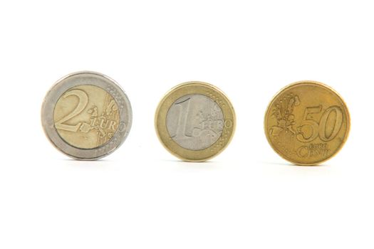 three euro coins isolated on white background money and finance concepts
